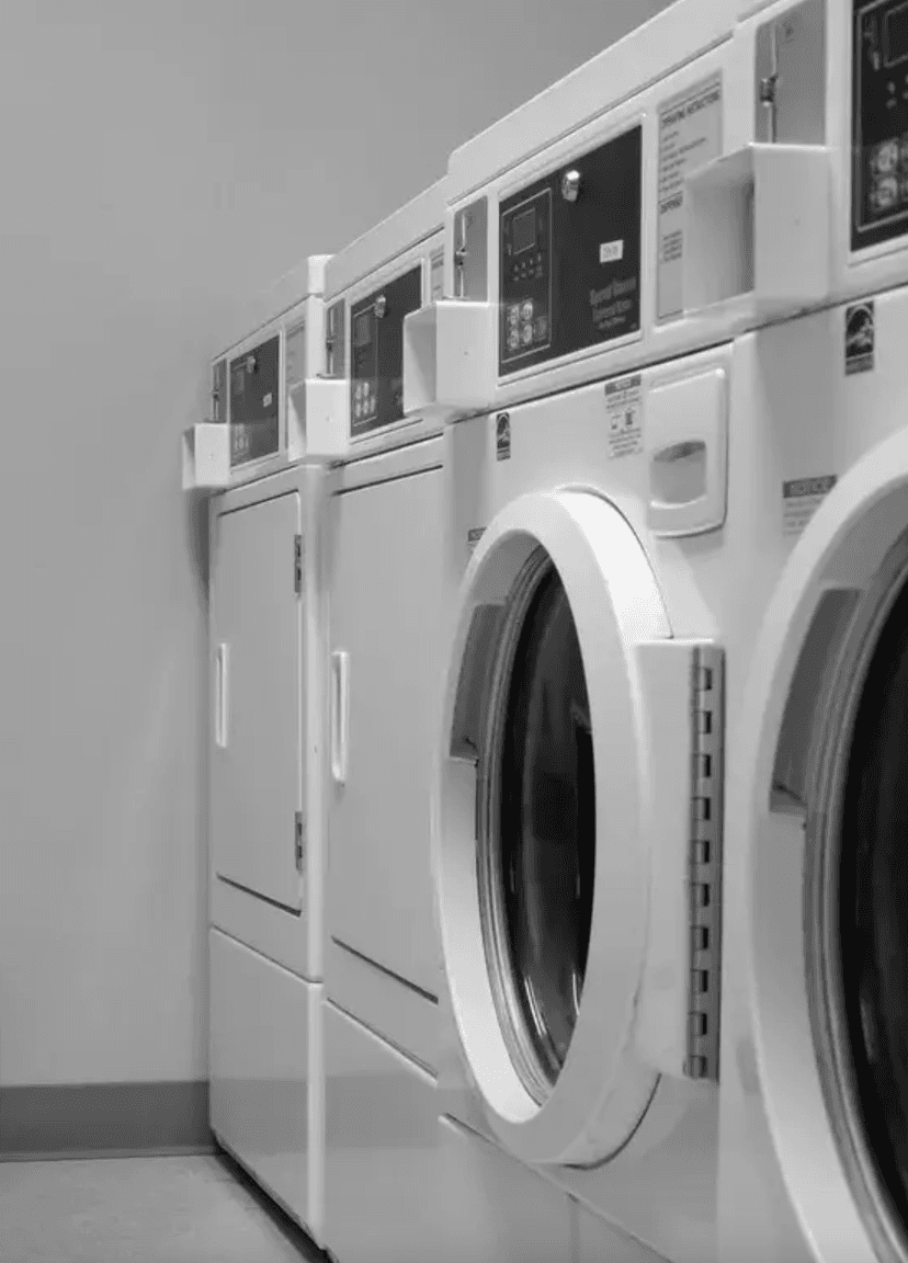 Row of refurbished washing machines